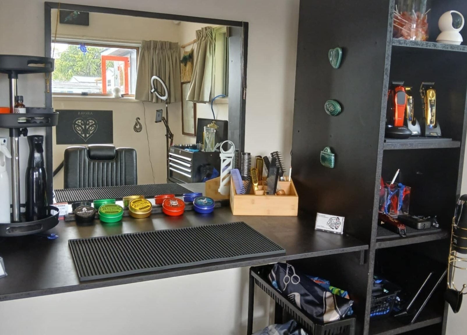 BBI Barbers grooming station in Whangārei, Northland, NZ with tools and styling products.