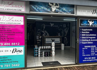 Bodi Laser, Benoni, Gauteng, ZA: wellness and beauty clinics with vibrant signage for various services.
