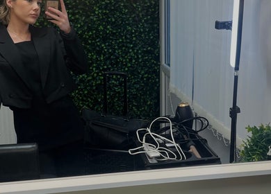ErinLeylandHair interior mirror view with stylist and tools in Accrington, England, GB.