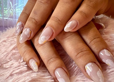Elegant floral nail art at Glamicious nails by Katia in L-imġarr, MT showcasing intricate design and glossy finish.