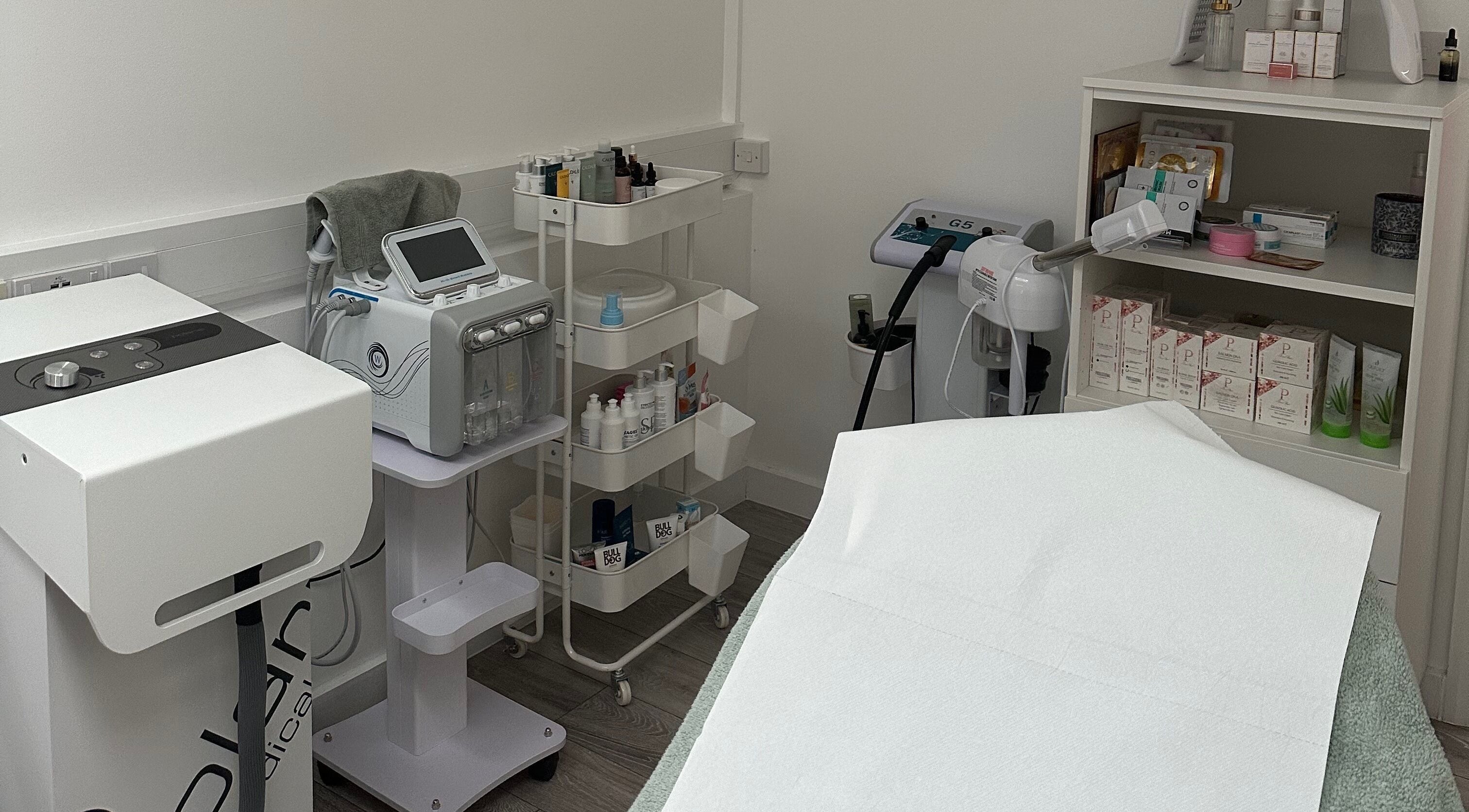Skin By Ezzra in London, England, GB offers a serene treatment corner with advanced skincare equipment.