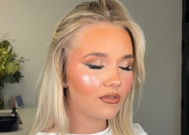 Expert makeup application at India Frances Makeup, Colwyn Bay, Wales, GB. Soft glam look with shimmer highlights.