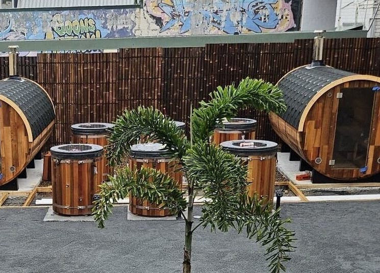 Wooden sauna and tubs at FICE Recovery Burleigh, Queensland, Queensland, AU offering a unique relaxation experience.