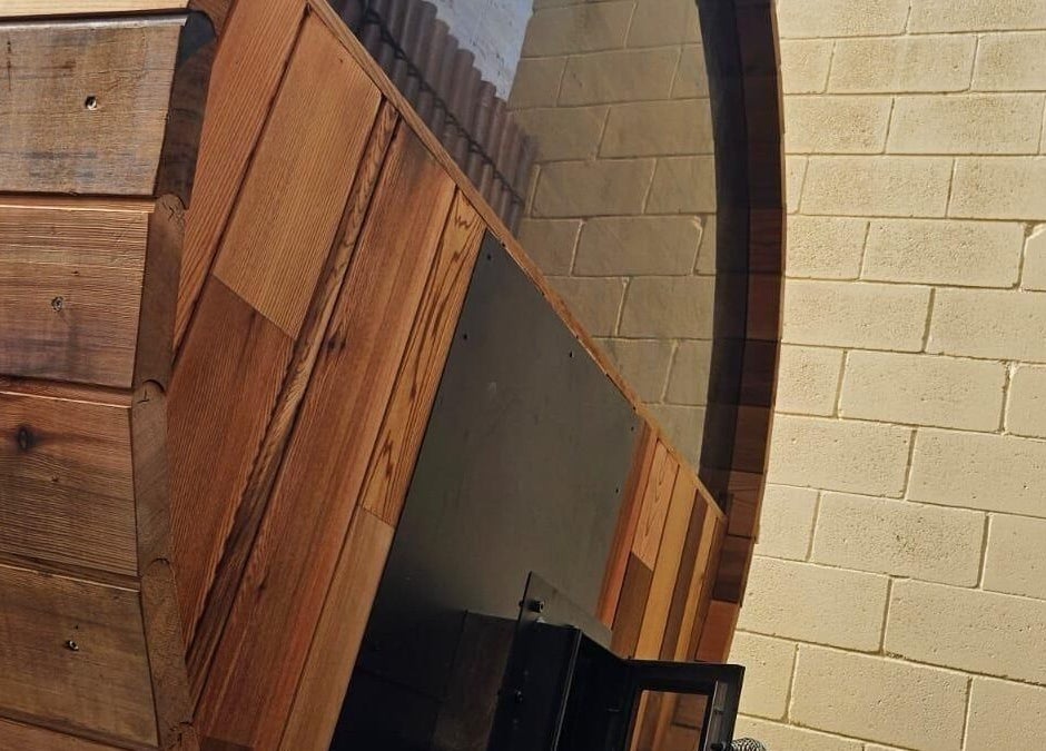 Wooden barrel sauna at FICE Recovery Burleigh, Queensland, AU offers an authentic wellness experience.