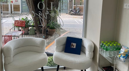 Elegant seating area at Lash Queen CNX in Chiangmai, เชียงใหม่, TH, offering a serene welcome to visitors.