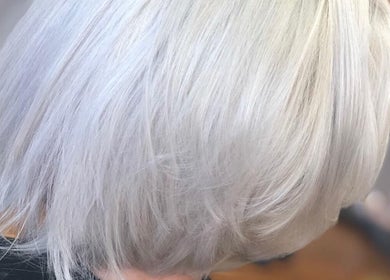 Close-up of sleek platinum blonde hair at Cream Hair artistry by Tove in Southport, Queensland, AU.