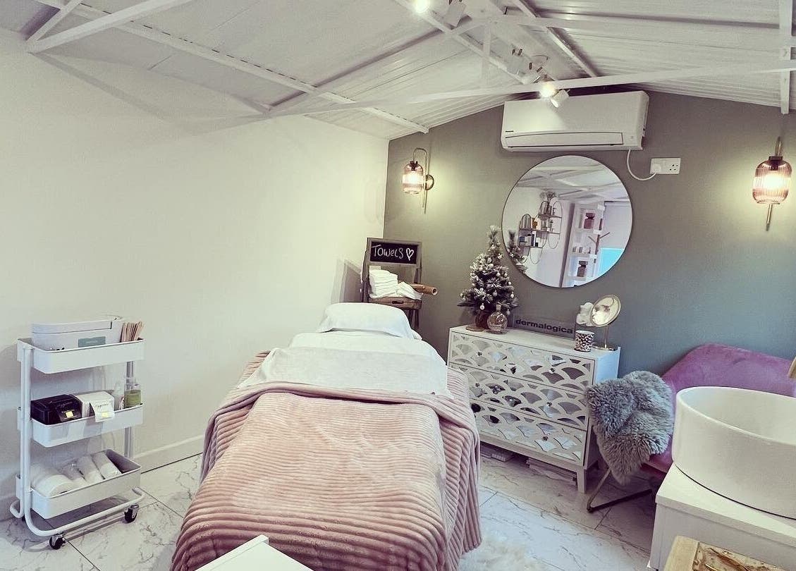 Elegant treatment room at Beauty by Felicity in Addlestone, England, GB, showcasing a serene spa ambiance.