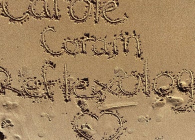 Carole Coram Reflexology etched in sand at Buckden, England, GB beach.