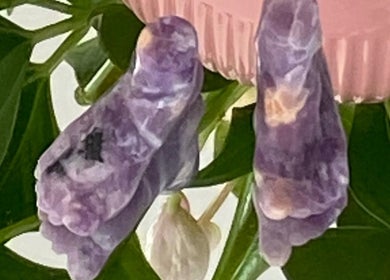 Amethyst stones on a plant at Carole Coram Reflexology, Buckden, England, GB. A touch of natural tranquility.