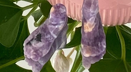 Amethyst stones on a plant at Carole Coram Reflexology, Buckden, England, GB. A touch of natural tranquility.