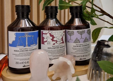 Trio of premium Davines shampoos at Hairmonic Head Spa London, offering luxurious hair care in London, England, GB.
