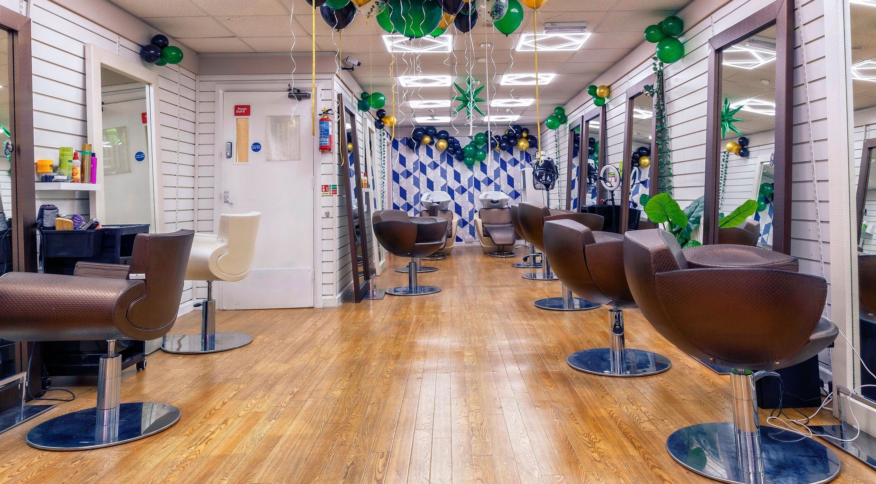Elegant salon chairs and mirrors at Blossom Beauty And Hair Salon, Bradford, England, GB, showcasing modern decor.