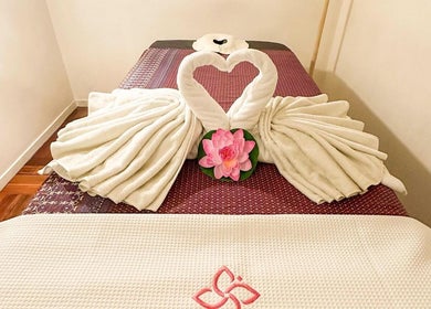 Luxurious massage table setup with towel swans at Leelawadee Thai Massage CBD, Auckland, Auckland, NZ.