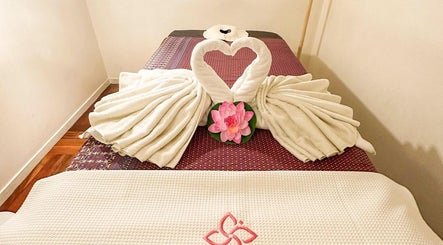 Luxurious massage table setup with towel swans at Leelawadee Thai Massage CBD, Auckland, Auckland, NZ.