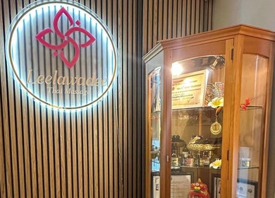 Elegant display at Leelawadee Thai Massage CBD, Auckland, NZ, showcasing awards and products.