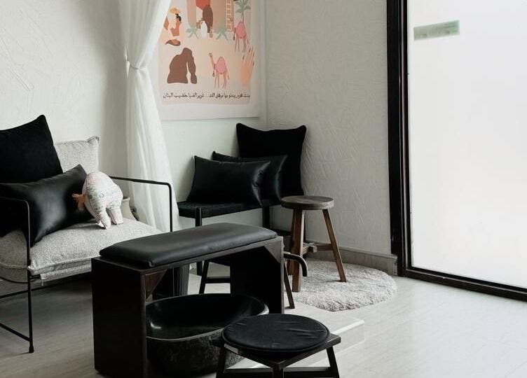 Cozy lounge area at Bannanah Spa | بنانة سبا, Riyadh, Riyadh Province, SA with minimalist decor.