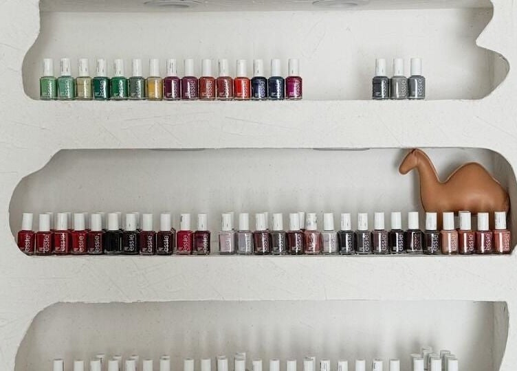 Nail polish display at Bannanah Spa | بنانة سبا in Riyadh, Riyadh Province, SA with camel decor.