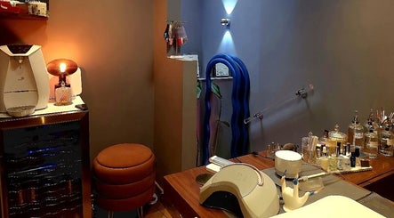 Interior of Crazylong Nail Studio in London, England, GB, showcasing cozy seating and manicure tools.