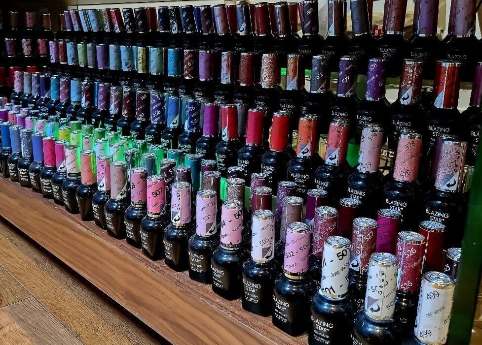 Colorful nail polish selection at Crazylong Nail Studio, London, England, GB.