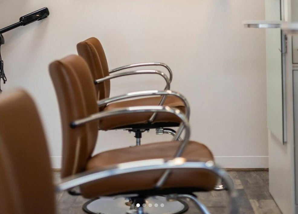 Modern salon chairs at Finca Beauty Salon - Aina Haina, Honolulu, Hawaii, US, enhance comfort and style.