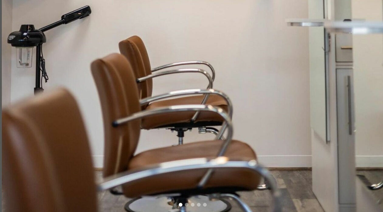 Modern salon chairs at Finca Beauty Salon - Aina Haina, Honolulu, Hawaii, US, enhance comfort and style.