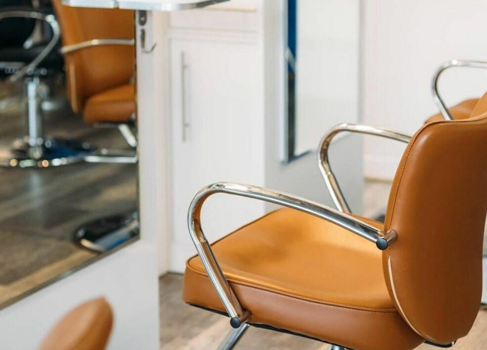 Modern salon chair at Finca Beauty Salon - Aina Haina in Honolulu, Hawaii, US.