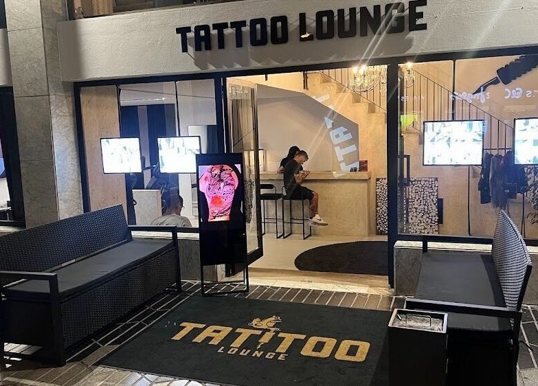 Exterior view of Tattoo Ibiza Lounge in Eivissa, Illes Balears, ES featuring a chic entrance and seating area.