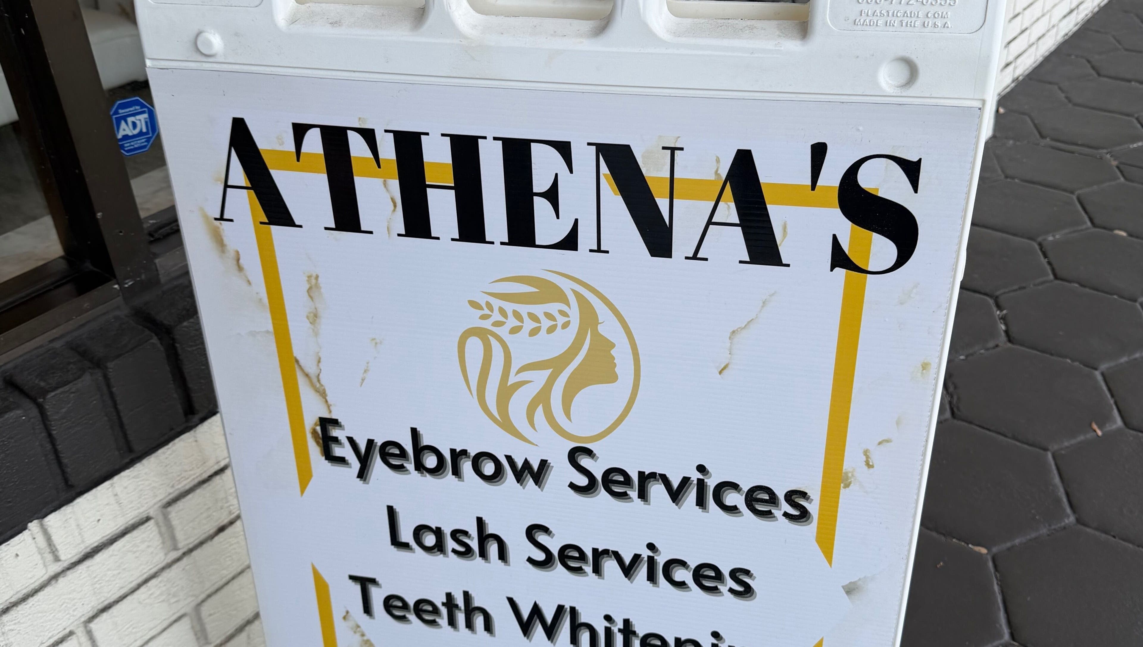 Athenas Aesthetics signage offering beauty services in Hollywood, Florida, US