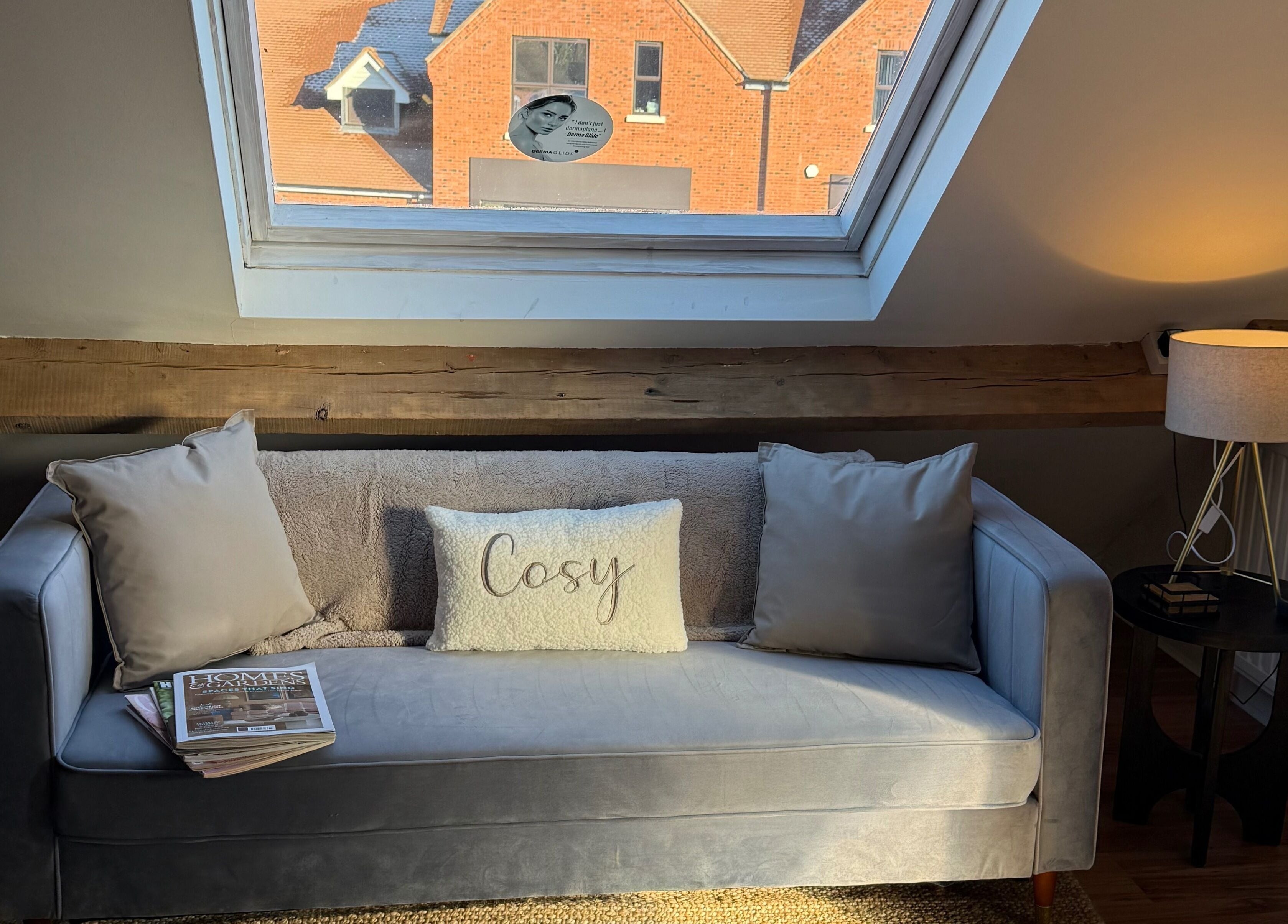 Relaxing corner with plush sofa at JL’s Hideaway Beauty & Aesthetics, Bewdley, England, GB.