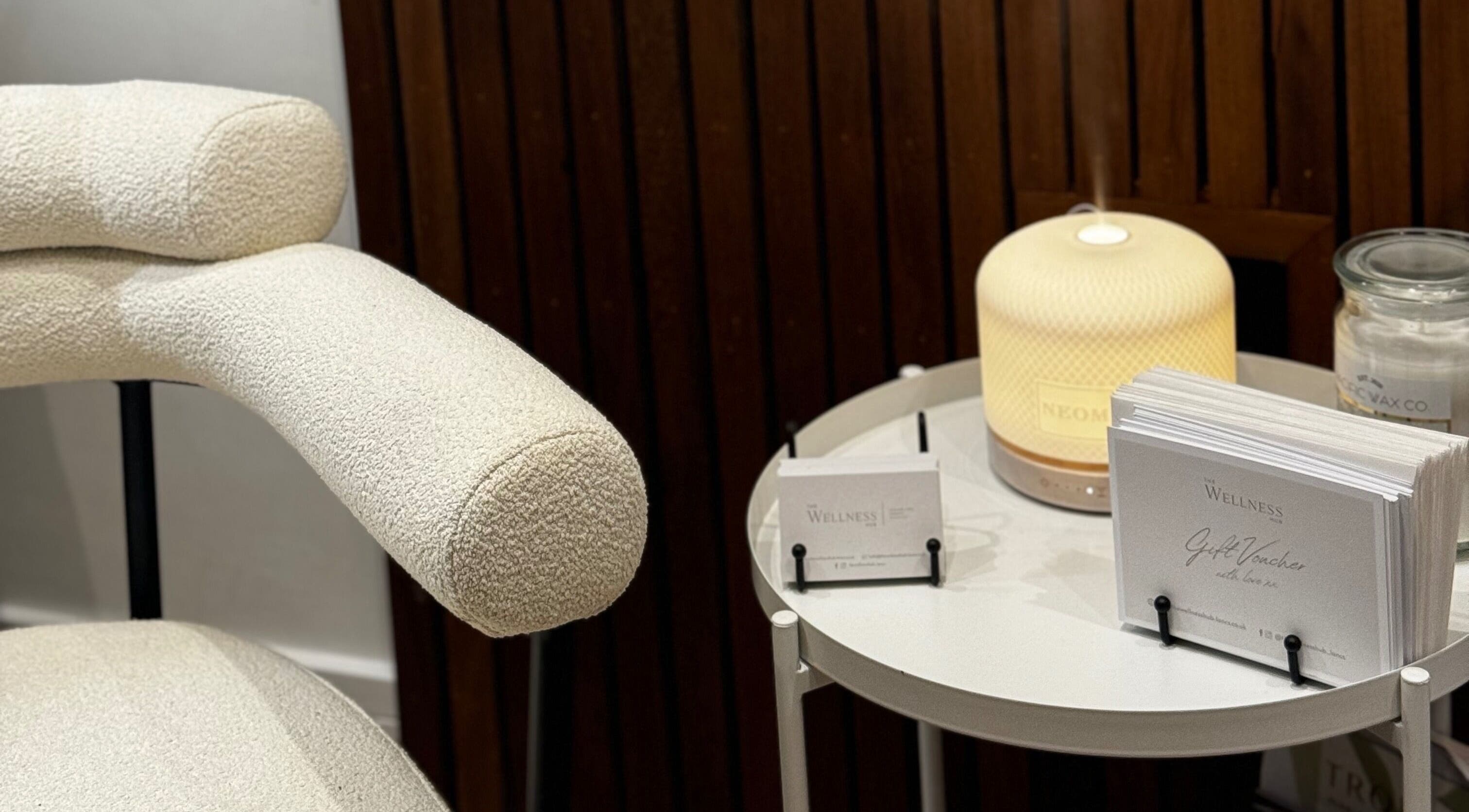 Relaxing chair and diffuser setup at The Wellness Hub, Blackburn, England, GB for a soothing ambiance.