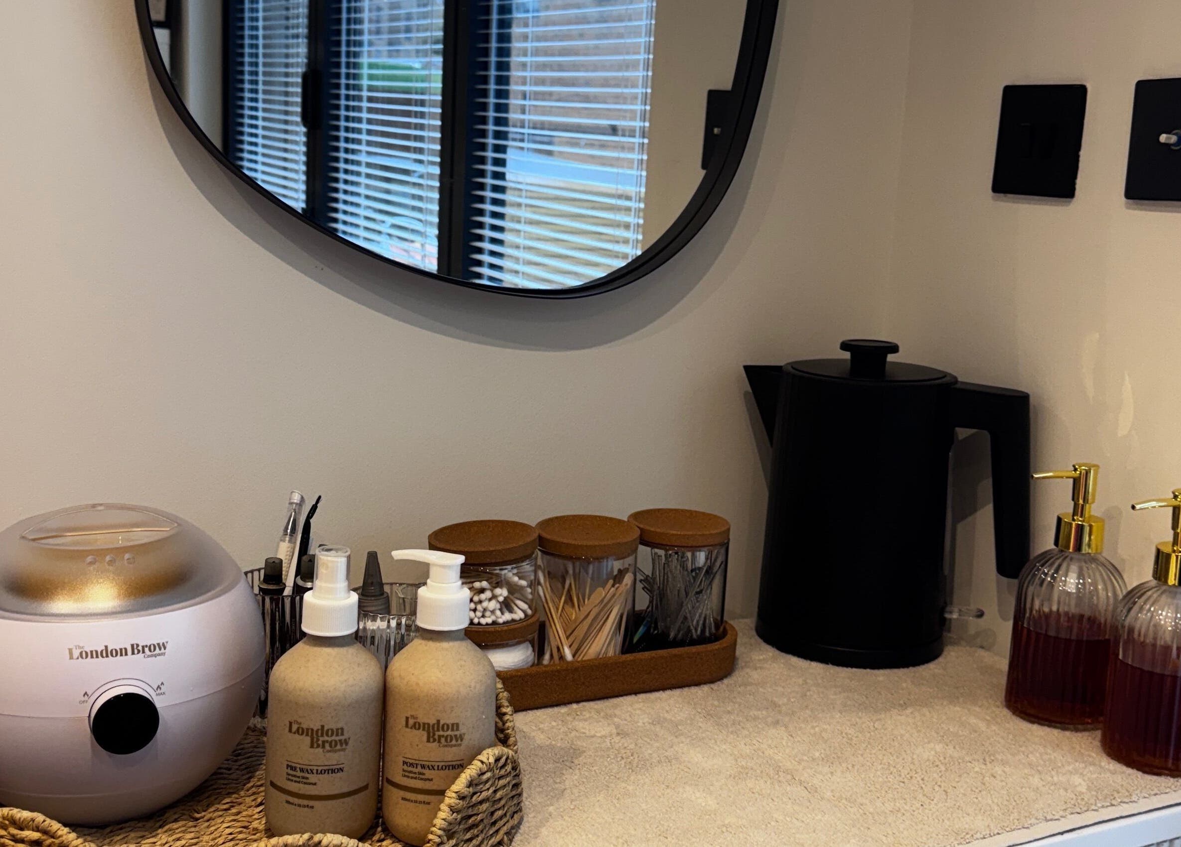 Aesthetic beauty setup at The Wellness Hub, showcasing grooming essentials. Located in Blackburn, England, GB.