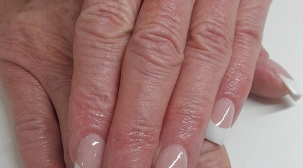 Classic French manicure at NATASHA'S NAILS, Kempton Park, Gauteng, ZA, showcasing precision and elegance.