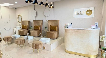 Luxurious nail salon interior at Elle Nail Couture, Boksburg, Gauteng, ZA, featuring plush seating and elegant decor.