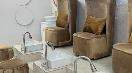Elegant pedicure chairs at Elle Nail Couture in Boksburg, Gauteng, ZA, offering a premium nail spa experience.