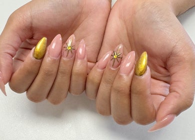 Elegant nail art with gold accents at Elle Nail Couture, Boksburg, Gauteng, ZA.