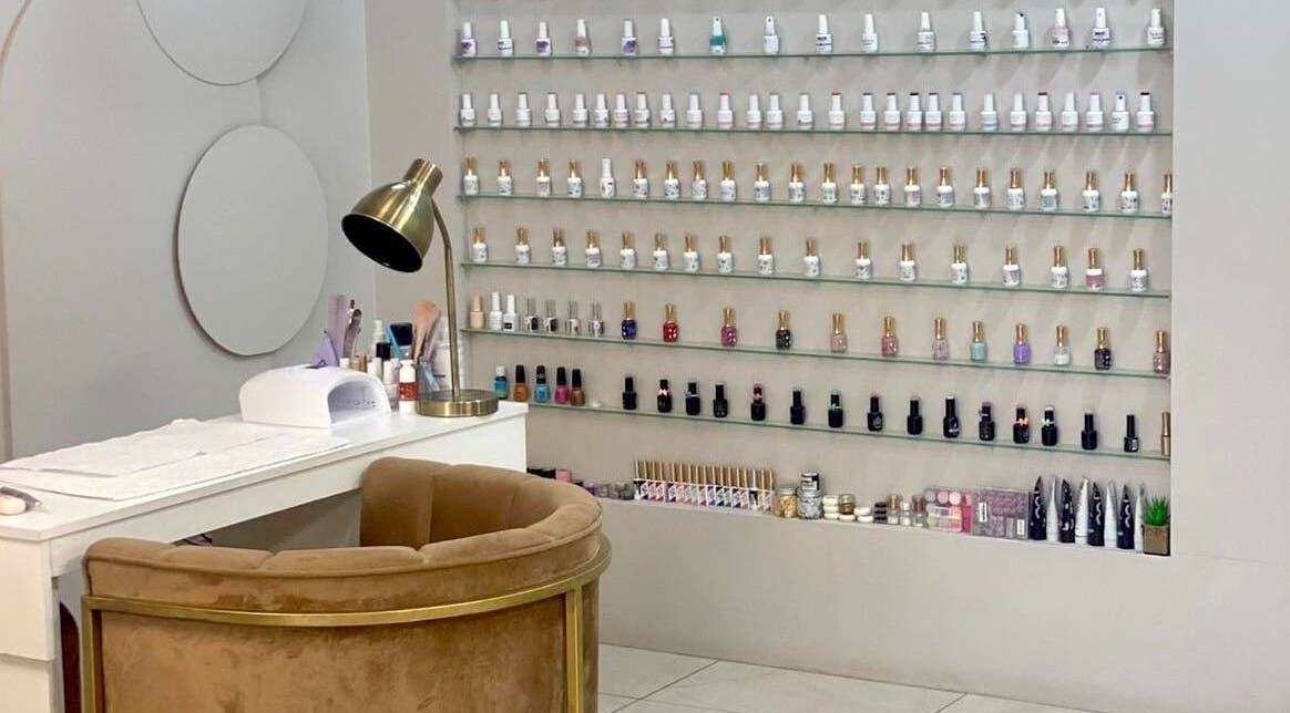 Elegant nail polish display at Elle Nail Couture, Boksburg, Gauteng, ZA, showcasing premium nail care.
