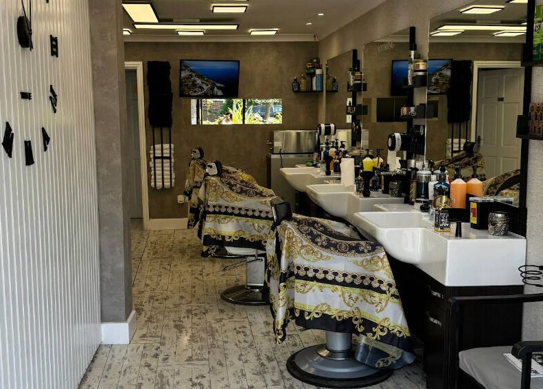 Chic interior of Sam’s Barbers London, with stylish chairs and decor, located in London, England, GB.