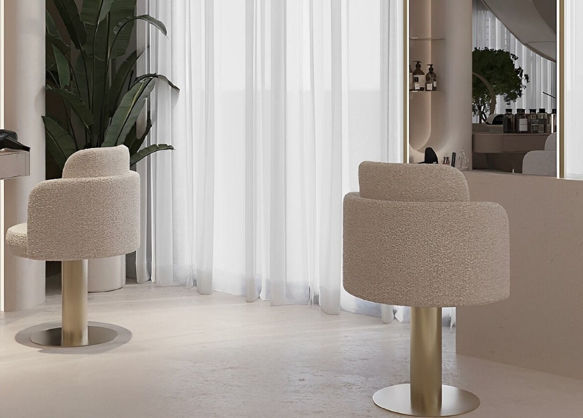 Elegant salon interior at Luci Luna, Dubai, Dubai, AE, featuring modern chairs and minimalist design.