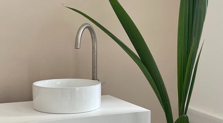 Minimalist white wash basin at Cleo Rogers Skincare - Alma Studios in Brighton And Hove, England, GB.