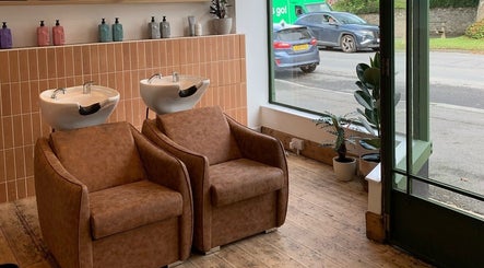 Modern wash stations at Rockey's Hair Studio, Braunton, England, GB for a stylish salon experience.