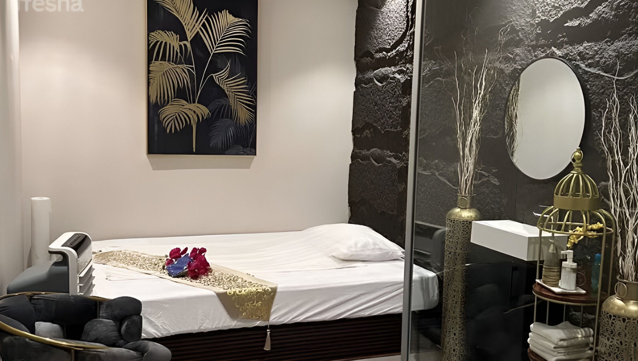 Elegant treatment room at Lotus Spa & Retreat in Dubai, Dubai, AE, featuring luxurious decor and a cozy bed.