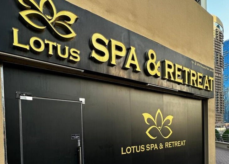 Lotus Spa & Retreat entrance sign in Dubai, Dubai, AE, showcasing its elegant branding.