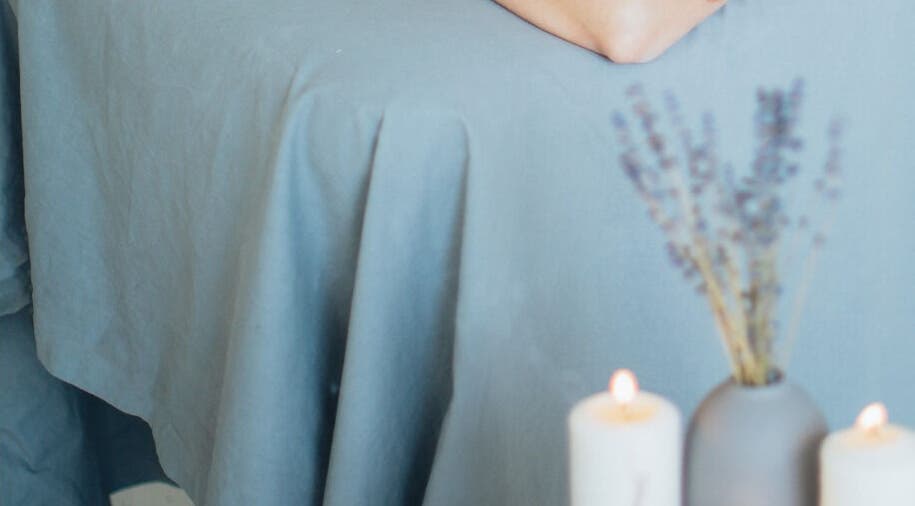 Relaxing spa table at Get Me Pampered (Bristol) with candles and lavender, Bristol, GB.