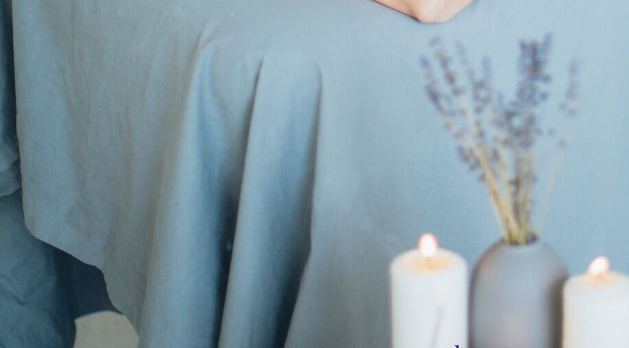 Tranquil massage setting at Get Me Pampered (Cardiff), Cardiff, GB. Soft candlelight and calming decor.