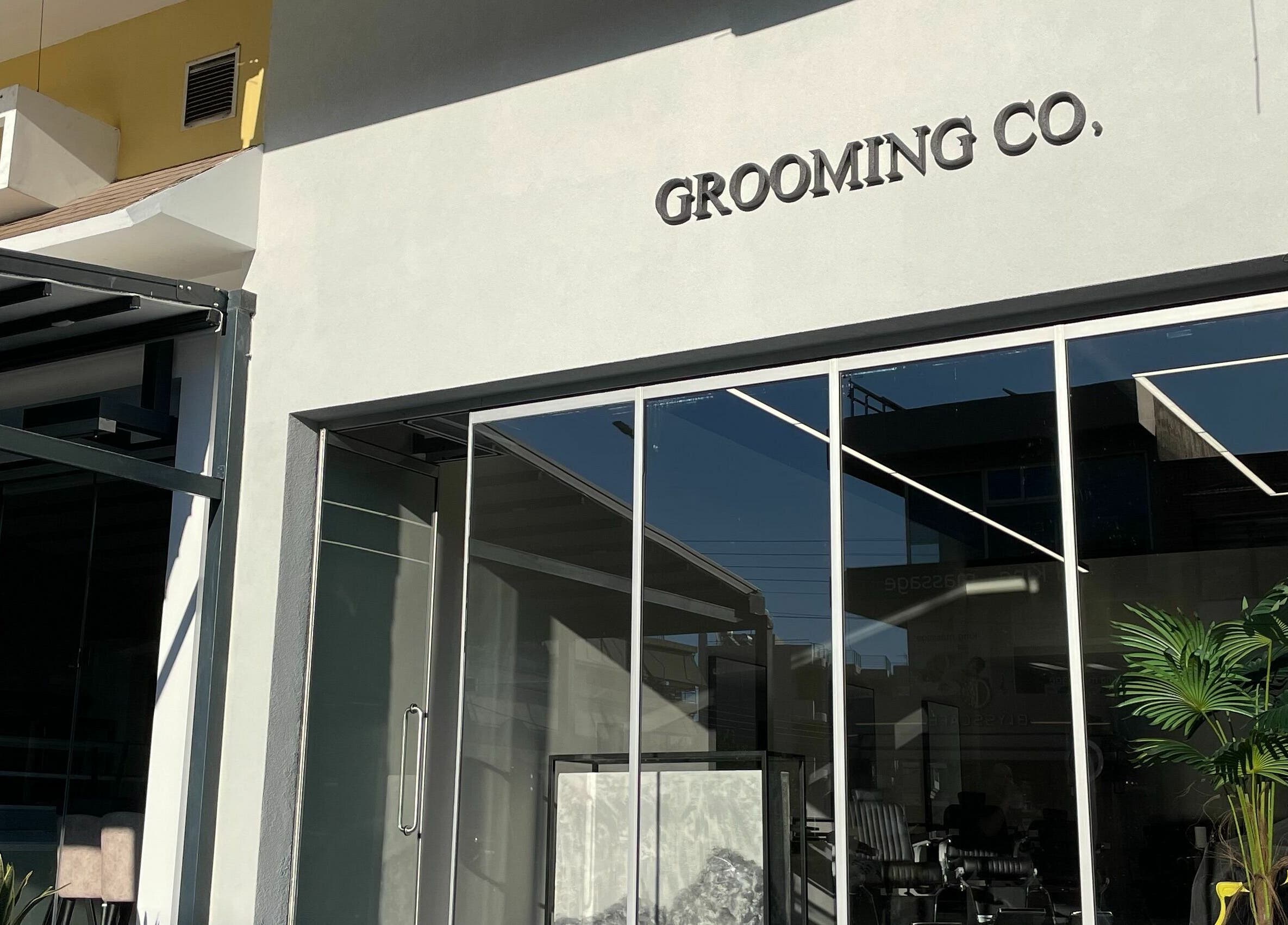 Front view of GROOMING CO. in Athens, GR showcasing a modern salon exterior.