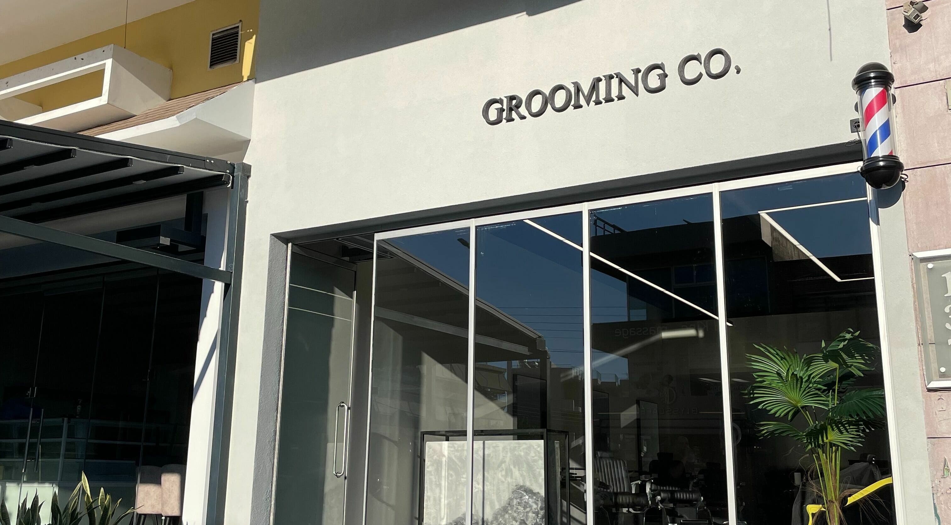 Front view of GROOMING CO. in Athens, GR showcasing a modern salon exterior.