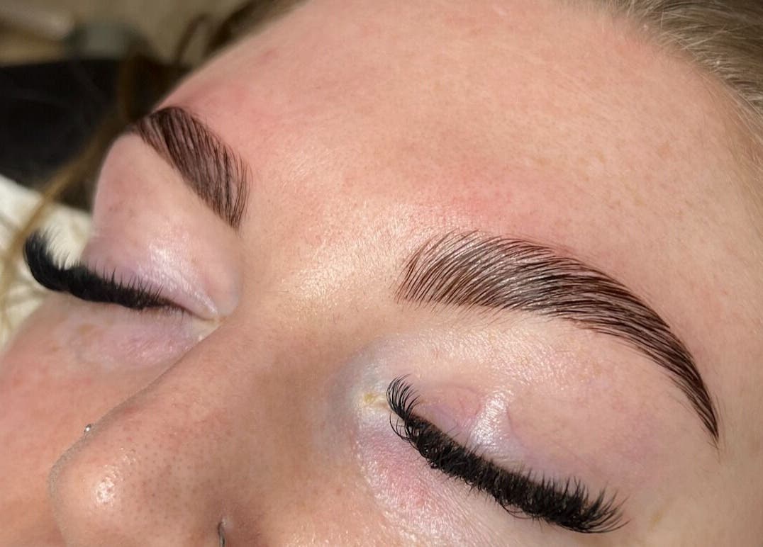Close-up of elegant eyelash and eyebrow grooming at GlowLyssa Esthetics, Ada, Oklahoma, US.