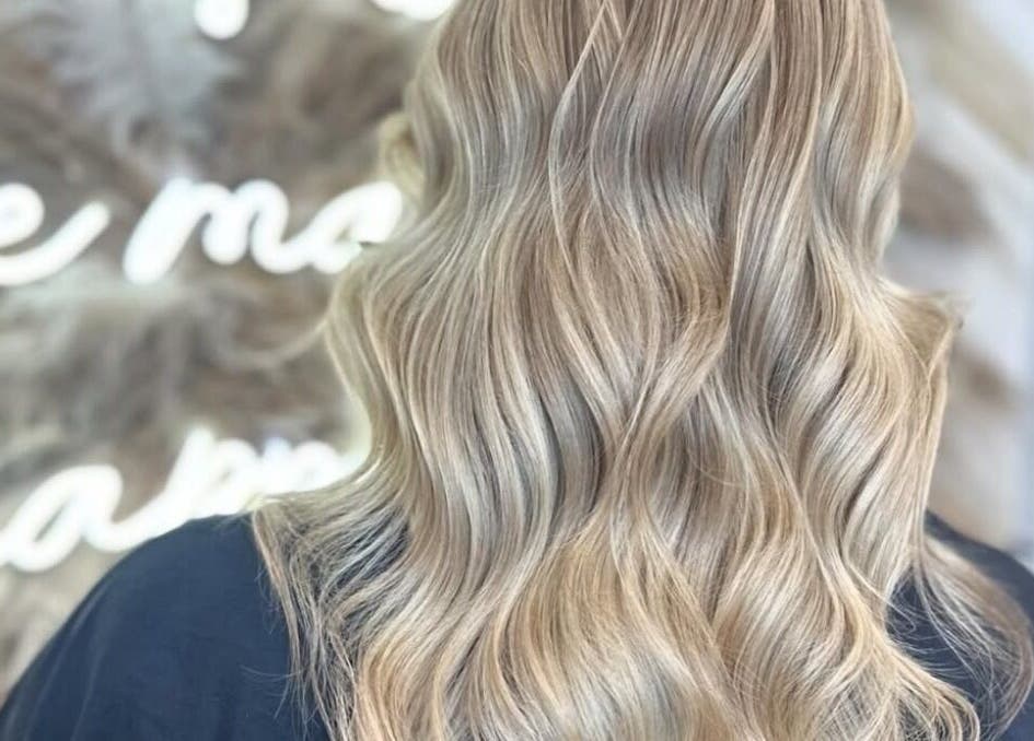 Blonde hair with soft waves at Chris Loen Hair Studio, Clydebank, Scotland, GB.