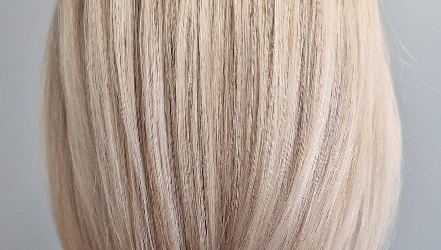 Close-up of sleek blonde hair at Anastasia, Taunton, England, GB, showcasing expert styling.