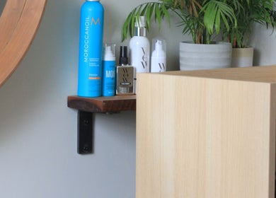 Beauty products on a wooden shelf at Anastasia, Taunton, England, GB, enhancing wellness experience.